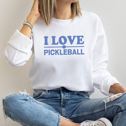 Cozy unisex sweatshirt with ‘I Love Pickleball’ text, perfect for pickleball fans and players